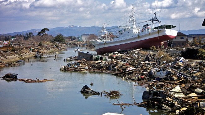 Boat-Floating-on-Debris-Ishinomaki-Higashi-Matsushima-Yamoto-Japan-Earthquake-Tsunami-Miyagi-2011